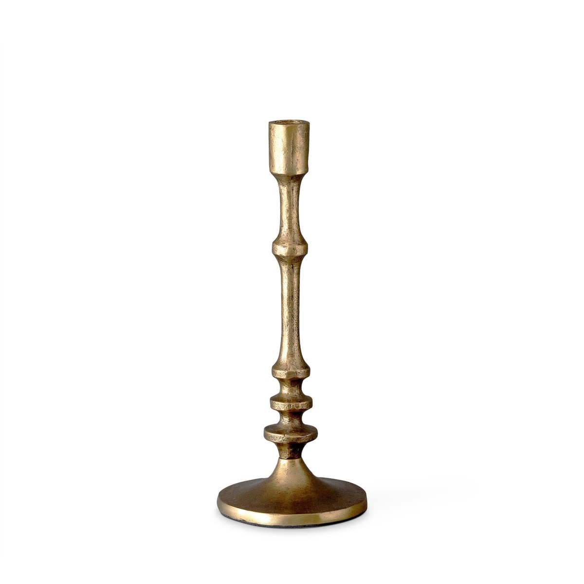 Medium aged-brass-finish candlestick with a slender shaped stem and round base