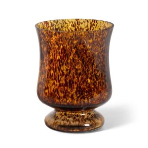 A footed glass vase in a warm amber-and-brown Tortoise finish, with a softly flared rim.