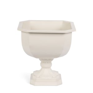 Soft white iron chalice planter with an octagonal rim and fluted pedestal base